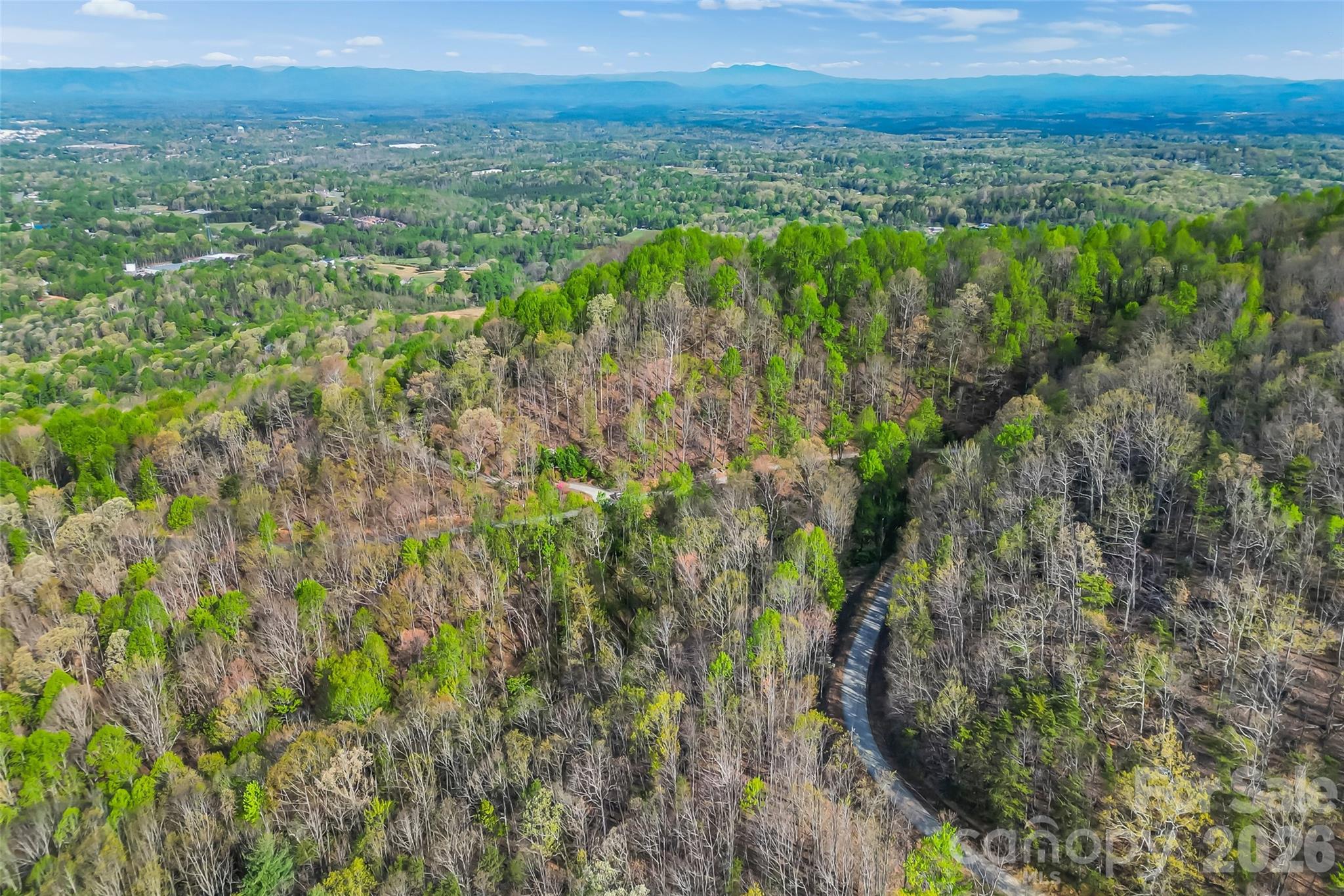 0 High Peak Mountain Road Valdese, NC 28690 - Photo 5 of 15 a view of a lush green outdoor space with a lake view and mountain view