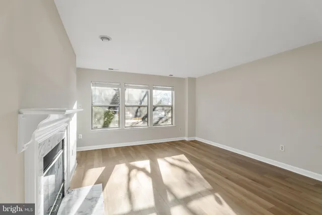 an empty room with windows