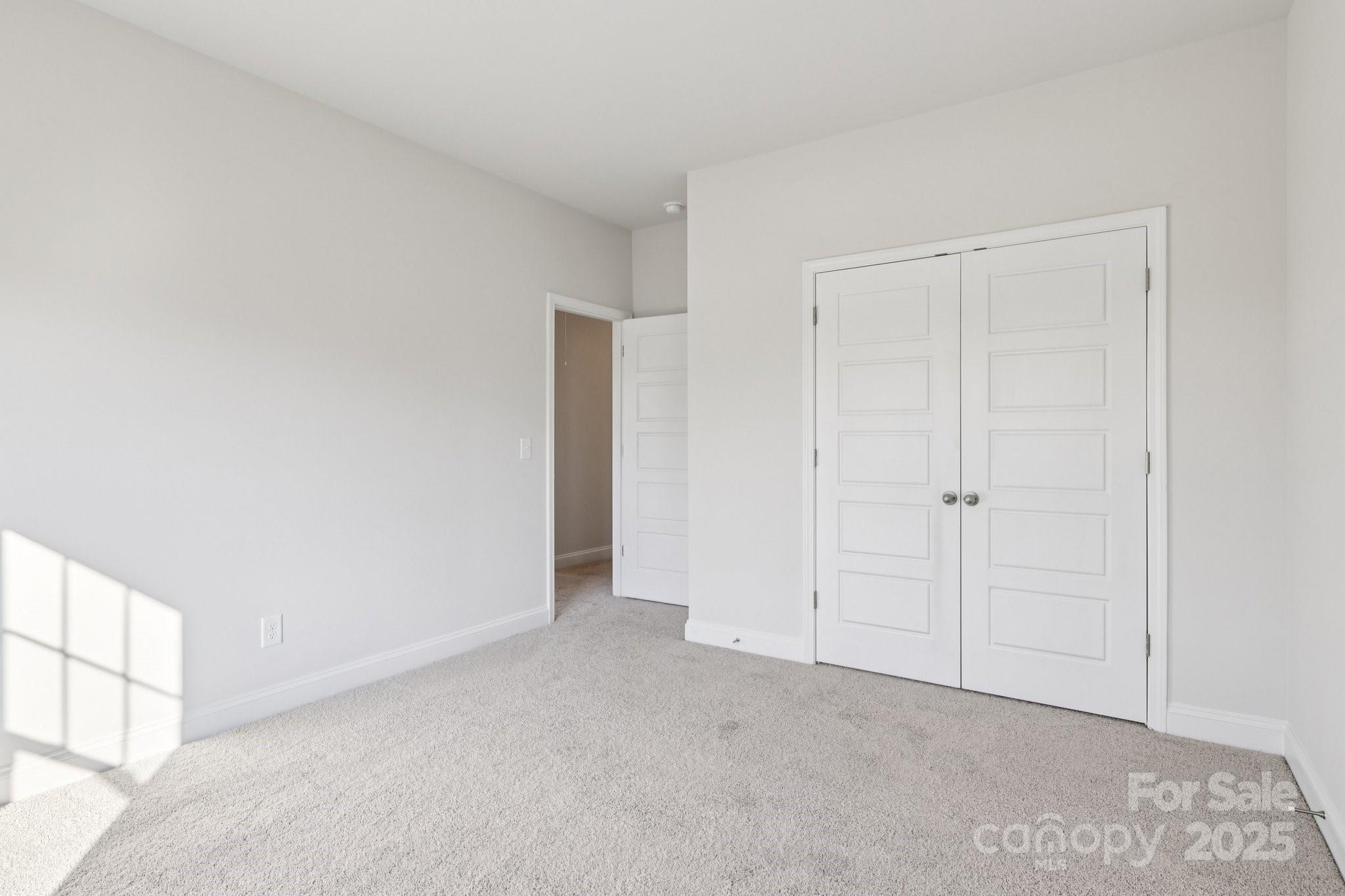 9612 Pointer Road, Unit 59 Huntersville, NC 28078 - Photo 27 of 43 a view of an empty room