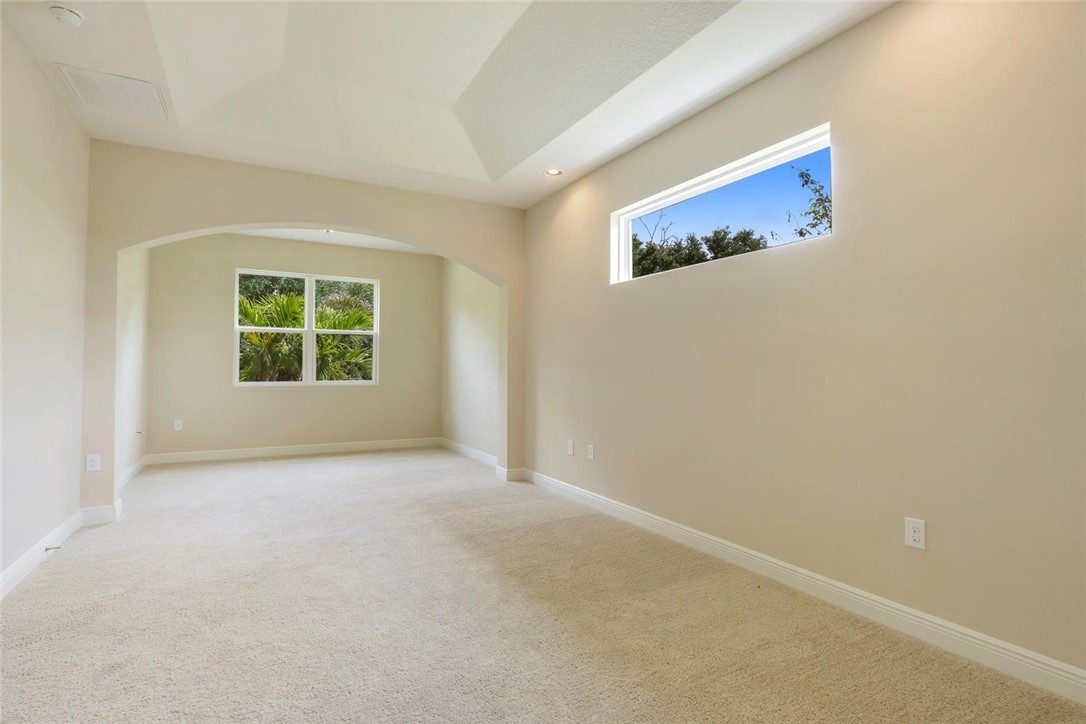 14 52nd Square Vero Beach, FL 32968 - Photo 9 of 25 an empty room with windows