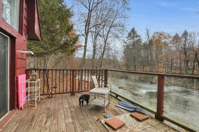 a view of balcony with furniture