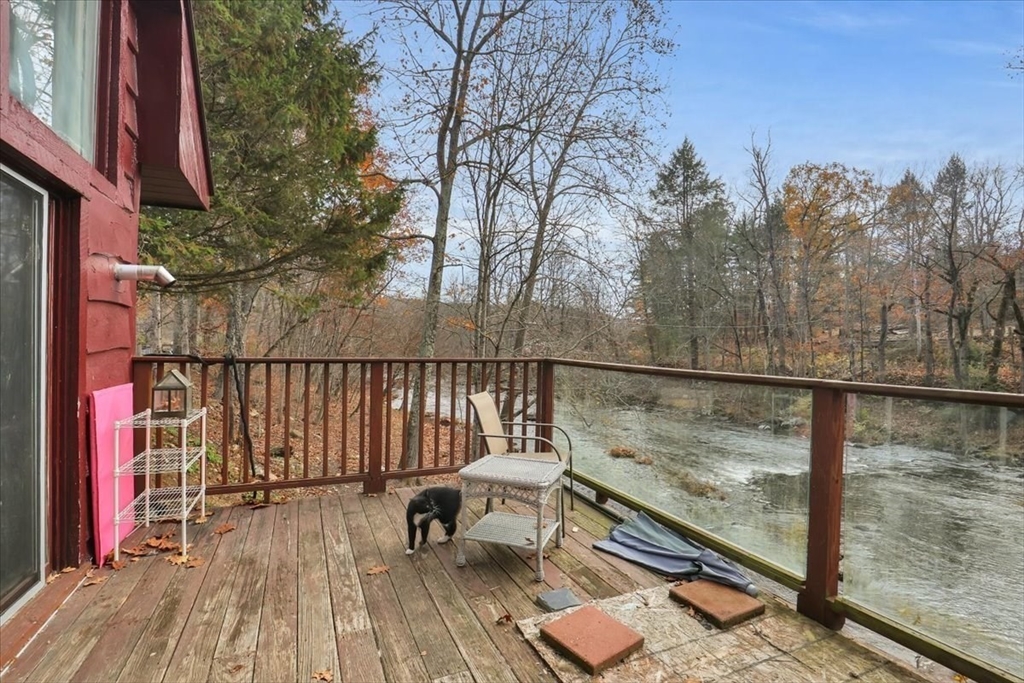 4 Stage Road Huntington, MA 01050 - Photo 20 of 32 a view of roof deck with wooden floor and fence