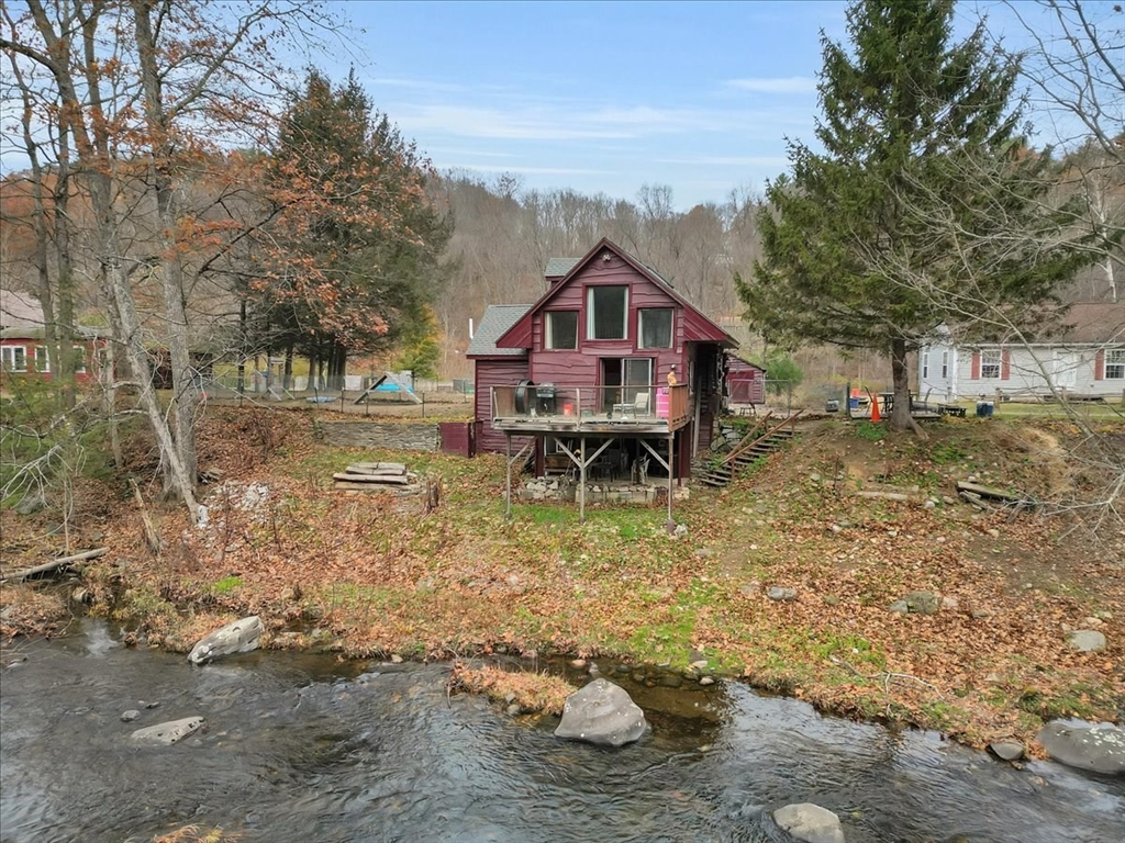 4 Stage Road Huntington, MA 01050 - Photo 2 of 32 a view of a house with a yard