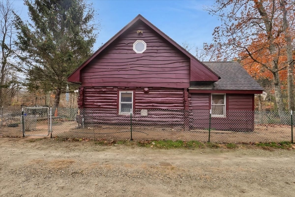 4 Stage Road Huntington, MA 01050 - Photo 23 of 32 a front view of a house with a yard