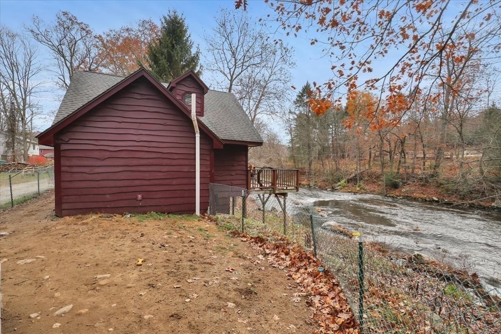 4 Stage Road Huntington, MA 01050 - Photo 24 of 32 a view of a backyard with a barn