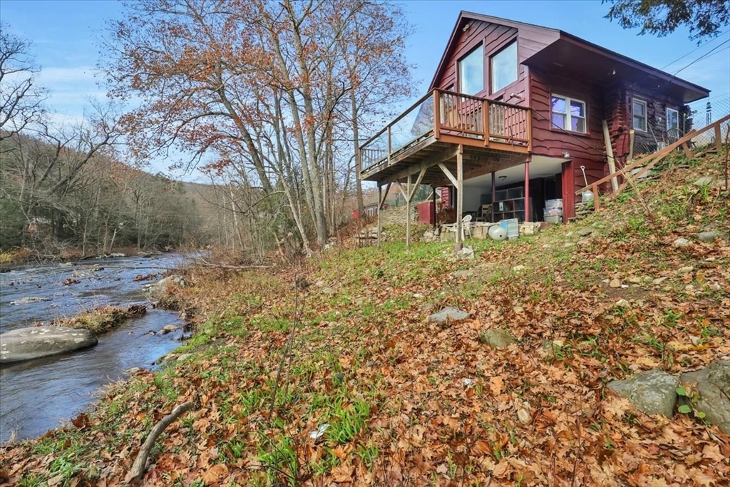 4 Stage Road Huntington, MA 01050 - Photo 3 of 32 a view of a house with a yard