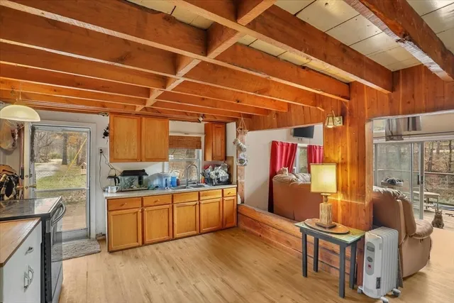 a living room with furniture and flat screen tv