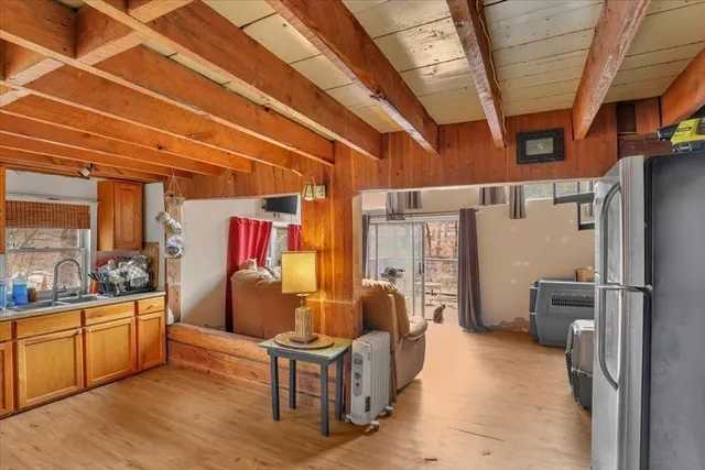 a living room with furniture and a rug