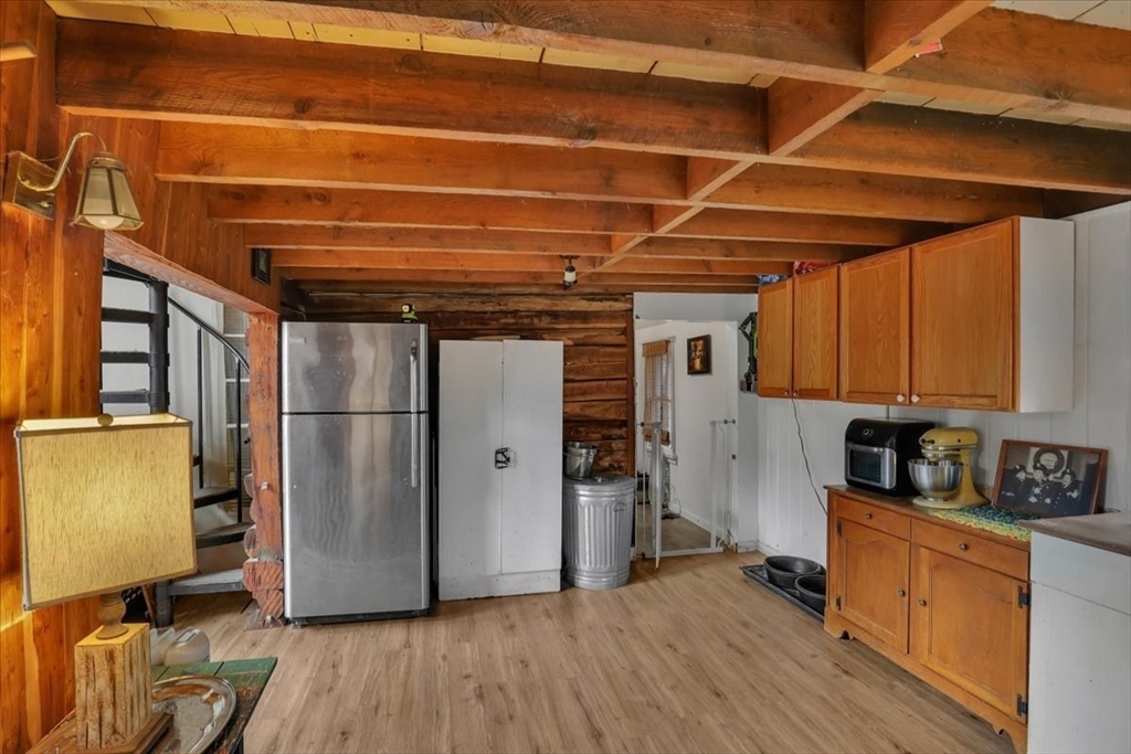 4 Stage Road Huntington, MA 01050 - Photo 10 of 32 a view of a refrigerator with wooden floor