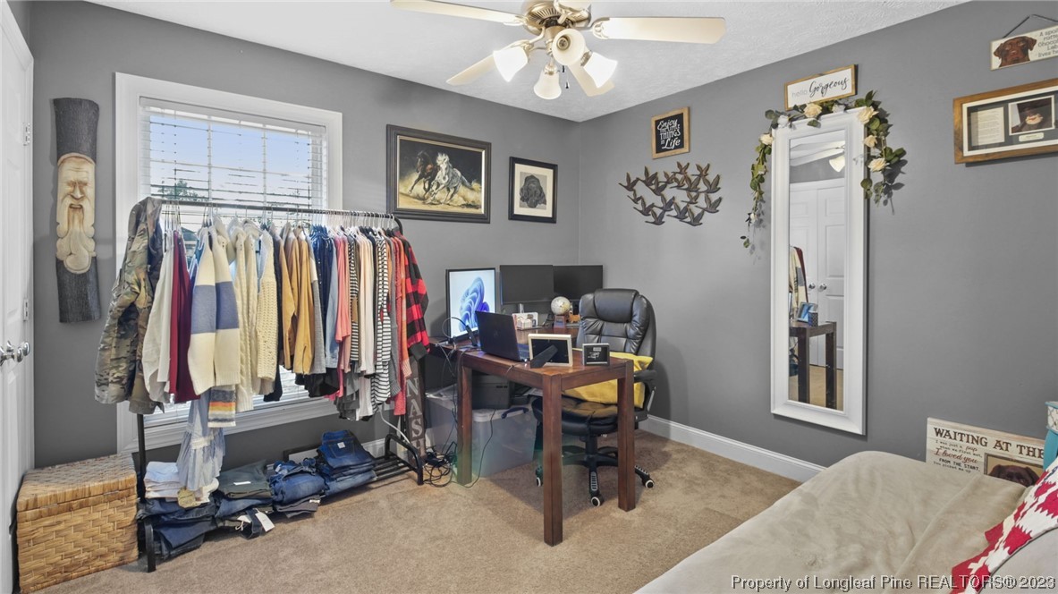 185 Russet Court Carthage, NC 28327 - Photo 13 of 32 a view of a room with gym equipment