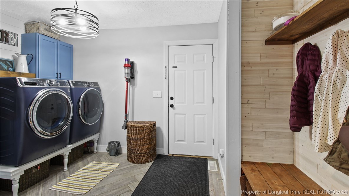 185 Russet Court Carthage, NC 28327 - Photo 19 of 32 a view of a hallway with washer and dryer