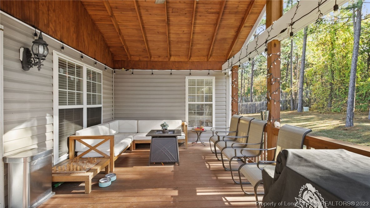 185 Russet Court Carthage, NC 28327 - Photo 28 of 32 a building outdoor space with patio furniture and potted plants