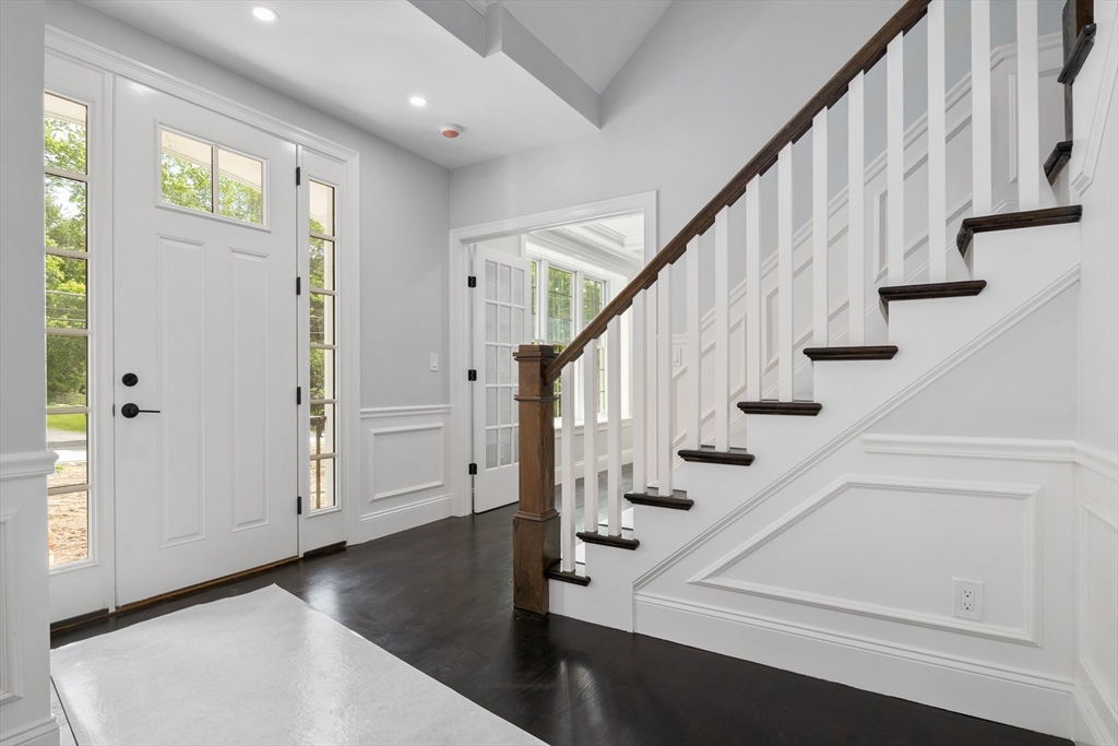 262 Meadowbrook Road Dedham, MA 02026 - Photo 4 of 37 a view of entryway with wooden floor and stairs