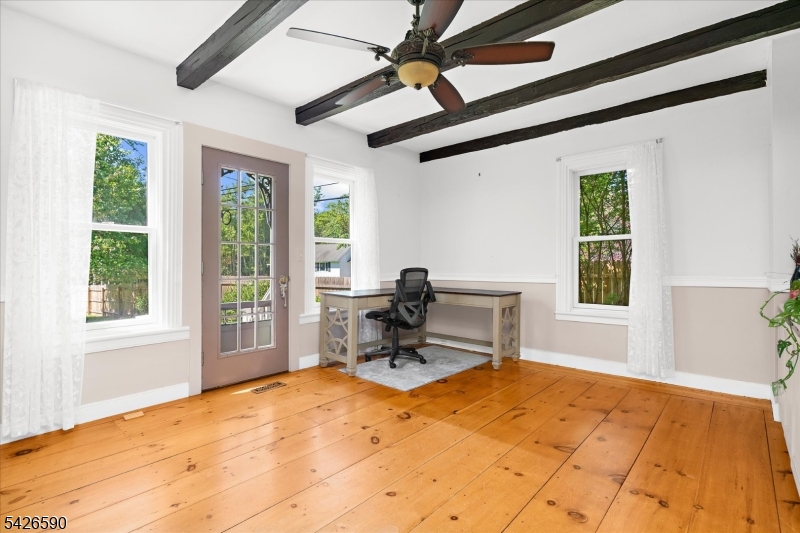 179 Lindbergh Road Hopewell, NJ 08525 - Photo 11 of 46 a view of a workspace with furniture and a window
