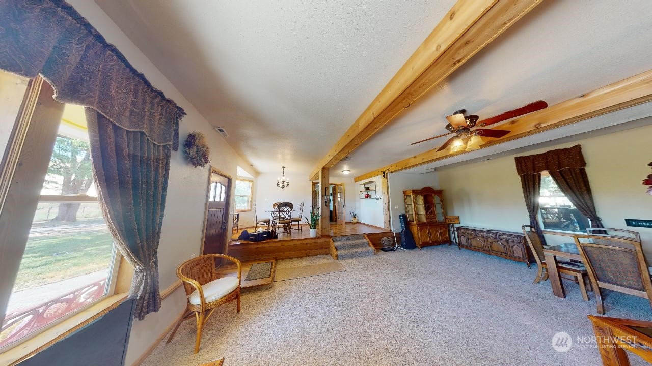 216 Tucannon Road Dayton, WA 99328 - Photo 11 of 39 a view of a livingroom with furniture and a window