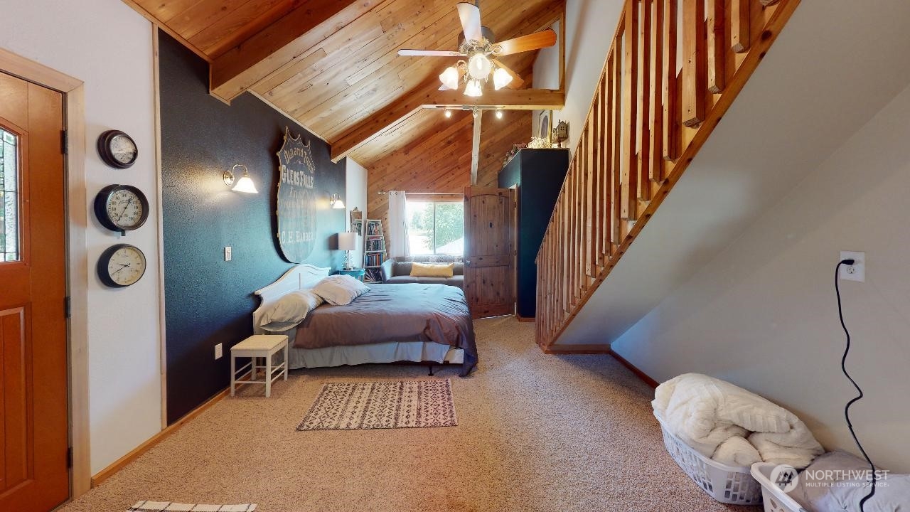 216 Tucannon Road Dayton, WA 99328 - Photo 13 of 39 a view of a livingroom with furniture and staircase