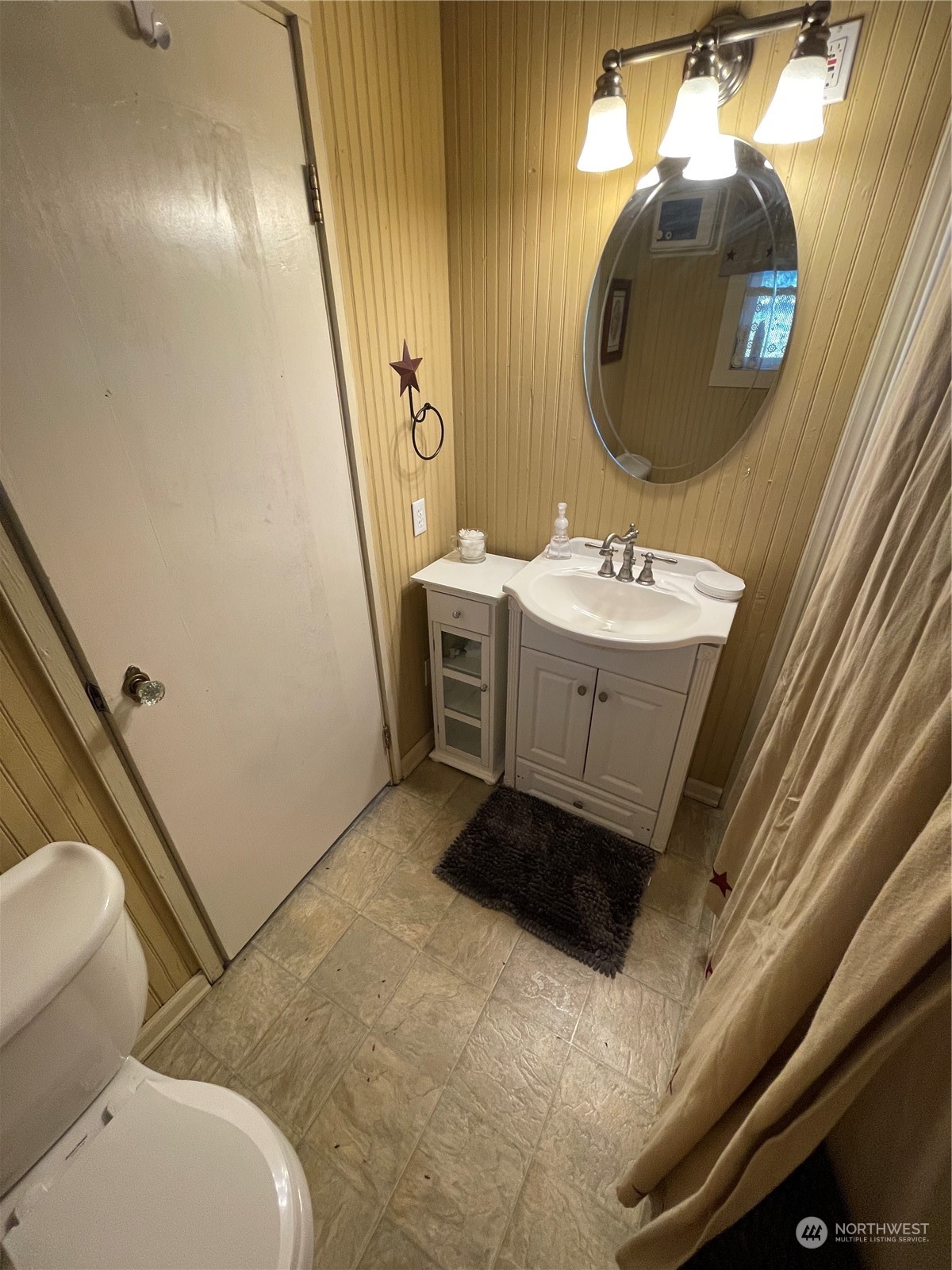 216 Tucannon Road Dayton, WA 99328 - Photo 39 of 39 a bathroom with a sink and mirror