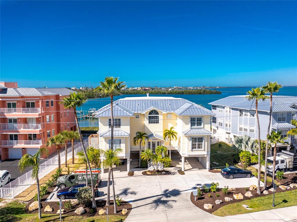 a front view of a building with sitting area