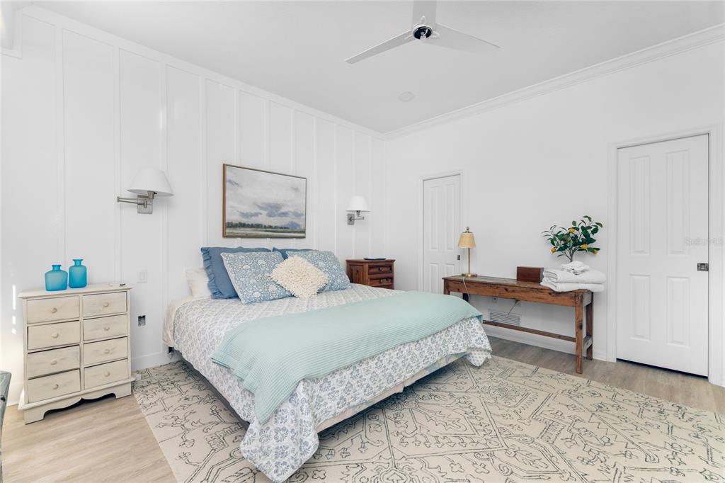 1400 Beach Road, Unit 1 Englewood, FL 34223 - Photo 29 of 68 a bedroom with a bed and a couch