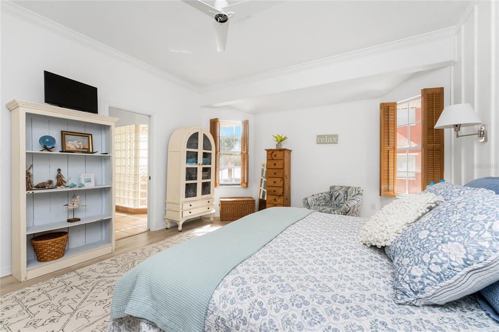 1400 Beach Road, Unit 1 Englewood, FL 34223 - Photo 30 of 68 a bedroom with a large bed and a view of bedroom