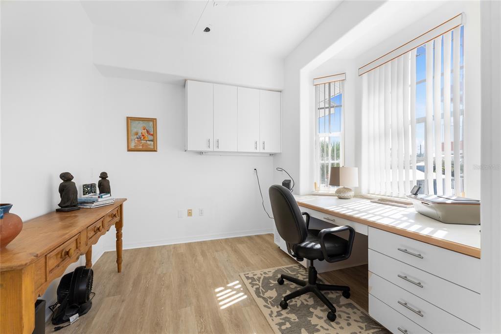1400 Beach Road, Unit 1 Englewood, FL 34223 - Photo 40 of 68 a view of a workspace with furniture and a window