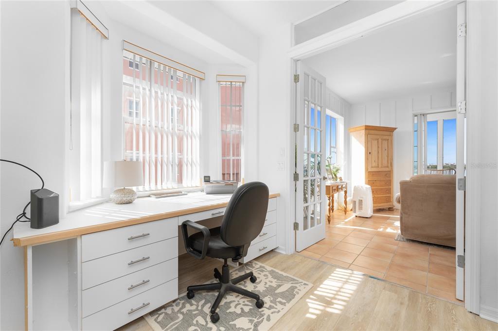 1400 Beach Road, Unit 1 Englewood, FL 34223 - Photo 41 of 68 a view of a livingroom with workspace and a window