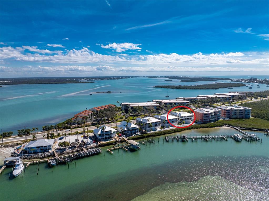 1400 Beach Road, Unit 1 Englewood, FL 34223 - Photo 58 of 68 a view of a lake in front of a building