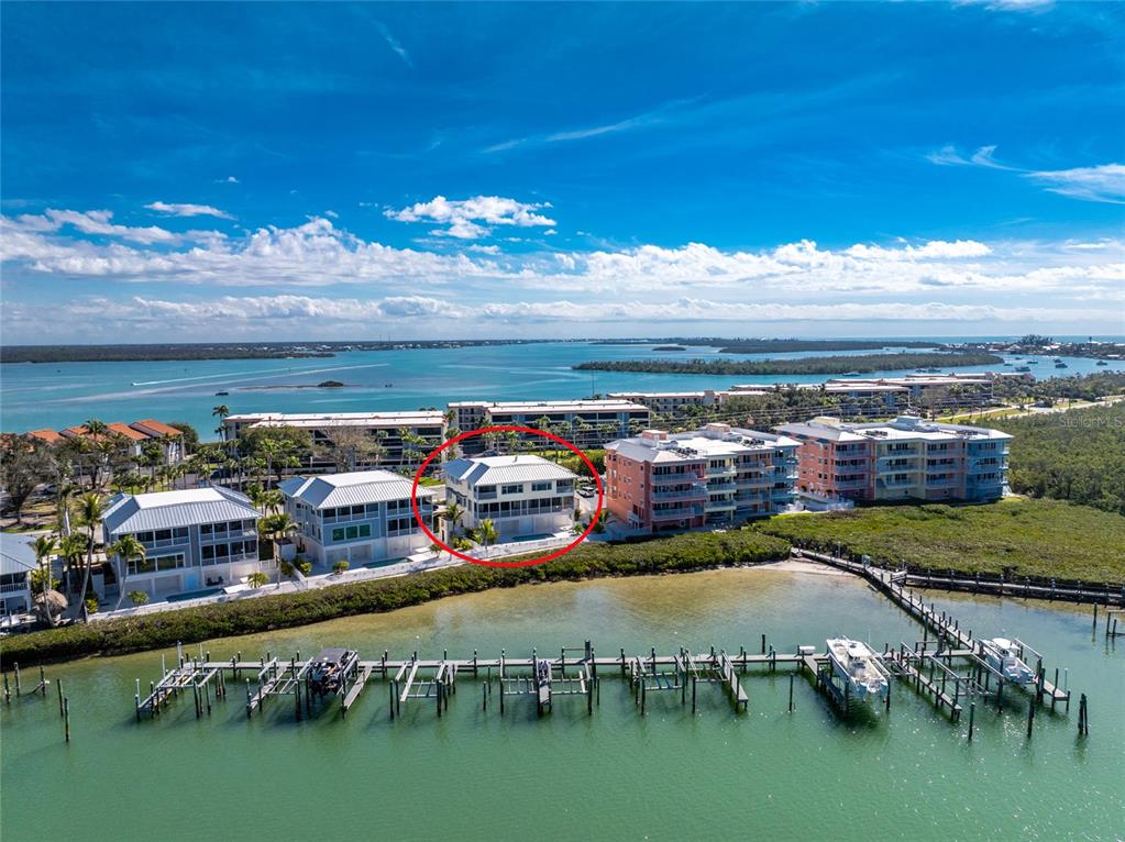 1400 Beach Road, Unit 1 Englewood, FL 34223 - Photo 60 of 68 a view of a city with lawn chairs