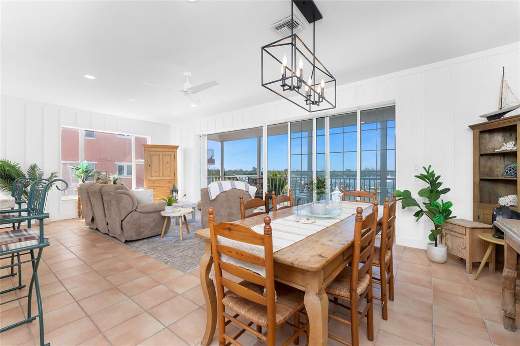 1400 Beach Road, Unit 1 Englewood, FL 34223 - Photo 6 of 68 a view of a dining room with furniture window and outside view