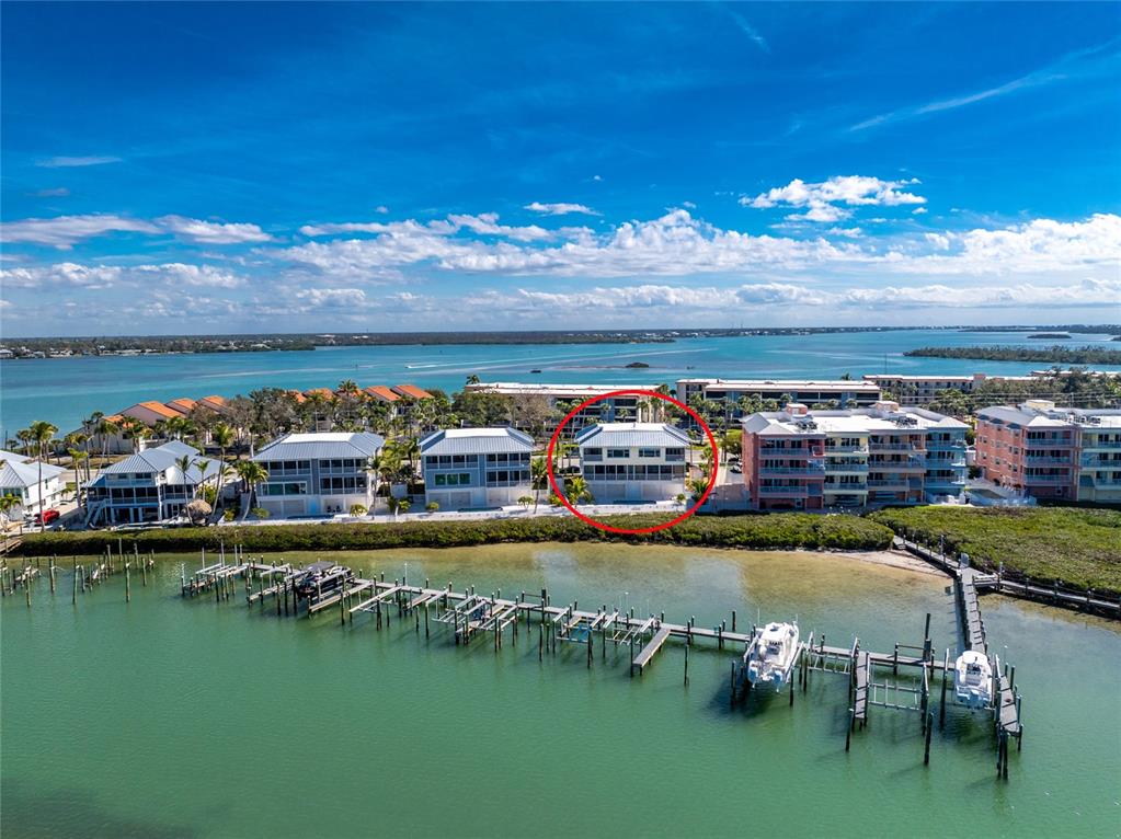 1400 Beach Road, Unit 1 Englewood, FL 34223 - Photo 61 of 68 a view of a city with lawn chairs