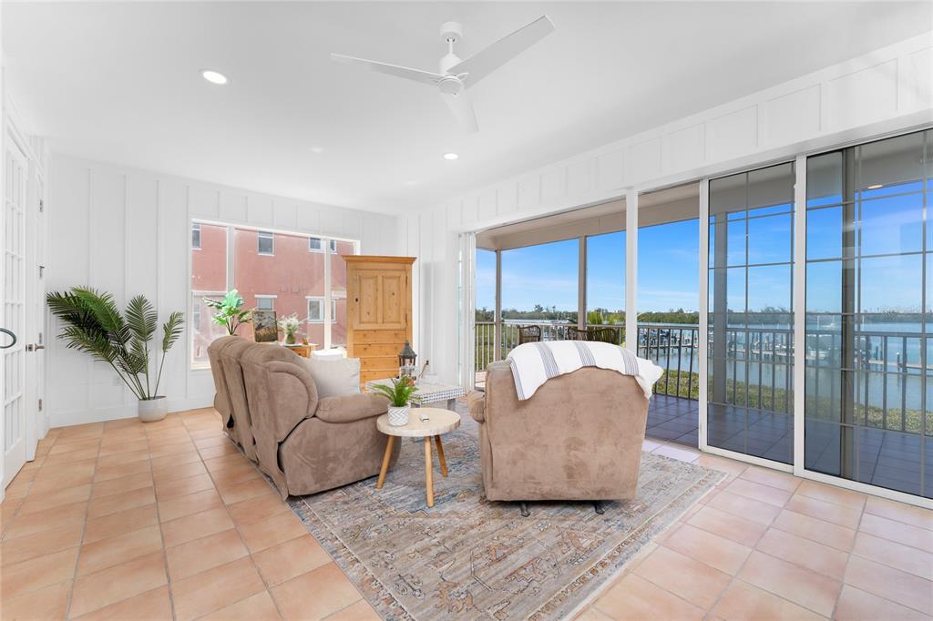 1400 Beach Road, Unit 1 Englewood, FL 34223 - Photo 7 of 68 a living room with furniture and a potted plant