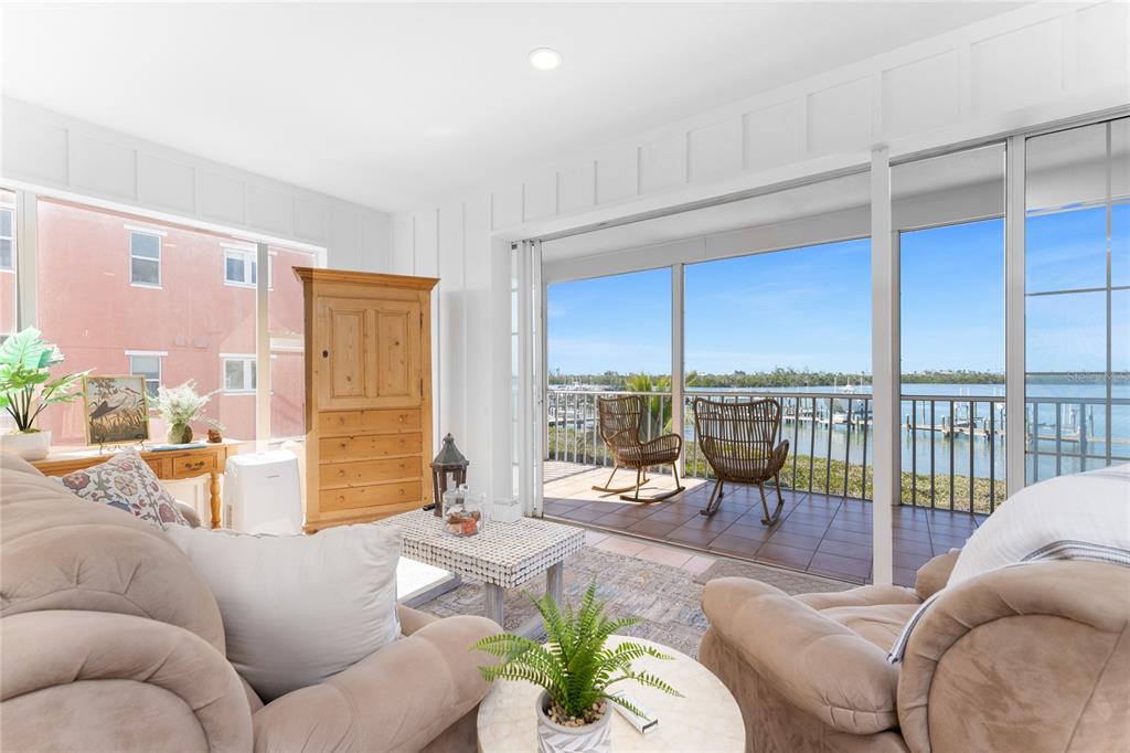 1400 Beach Road, Unit 1 Englewood, FL 34223 - Photo 8 of 68 a living room with furniture and a large window