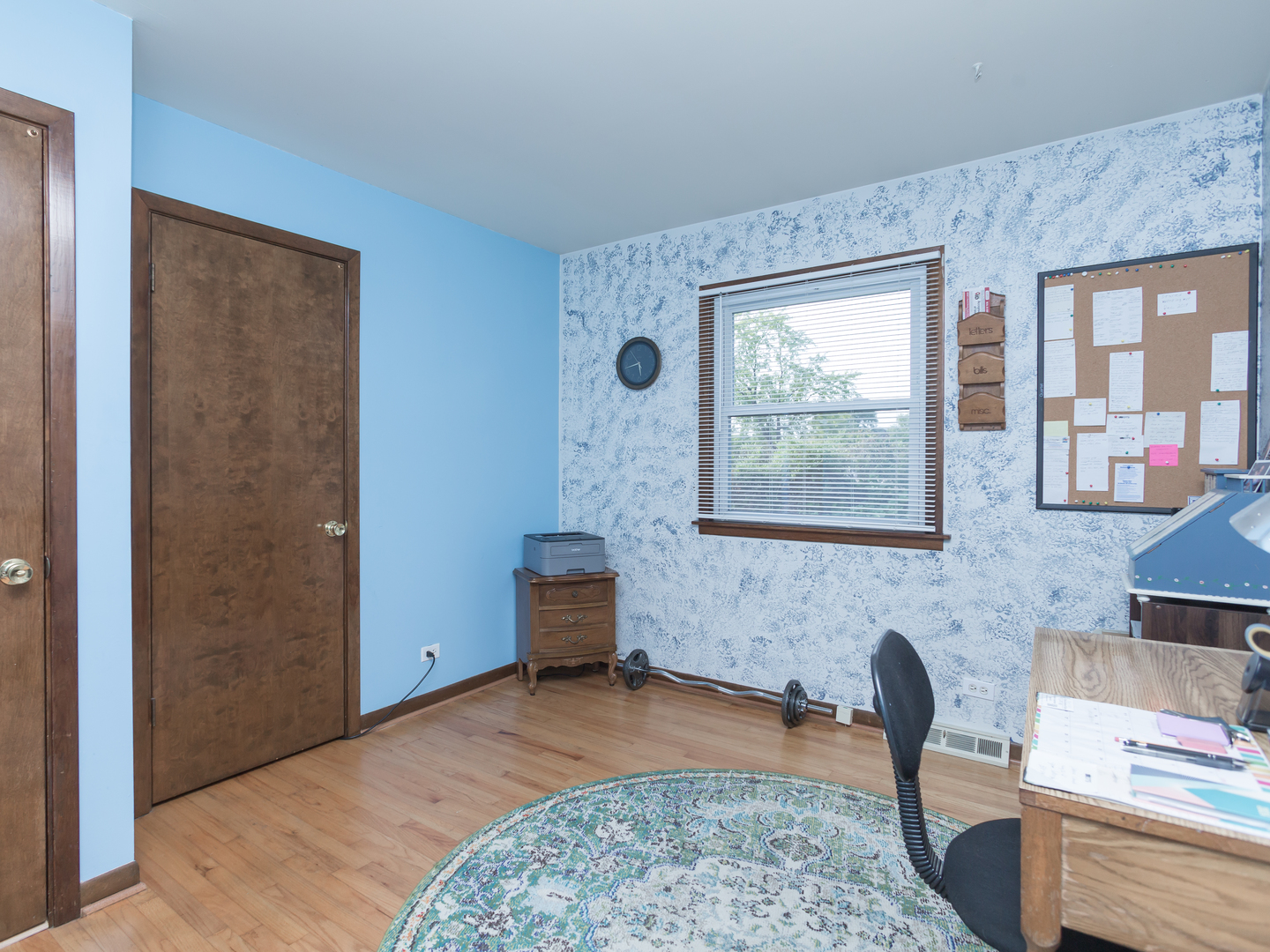 111 East Devon Avenue Bartlett, IL 60103 - Photo 11 of 20 a living room with furniture and a window
