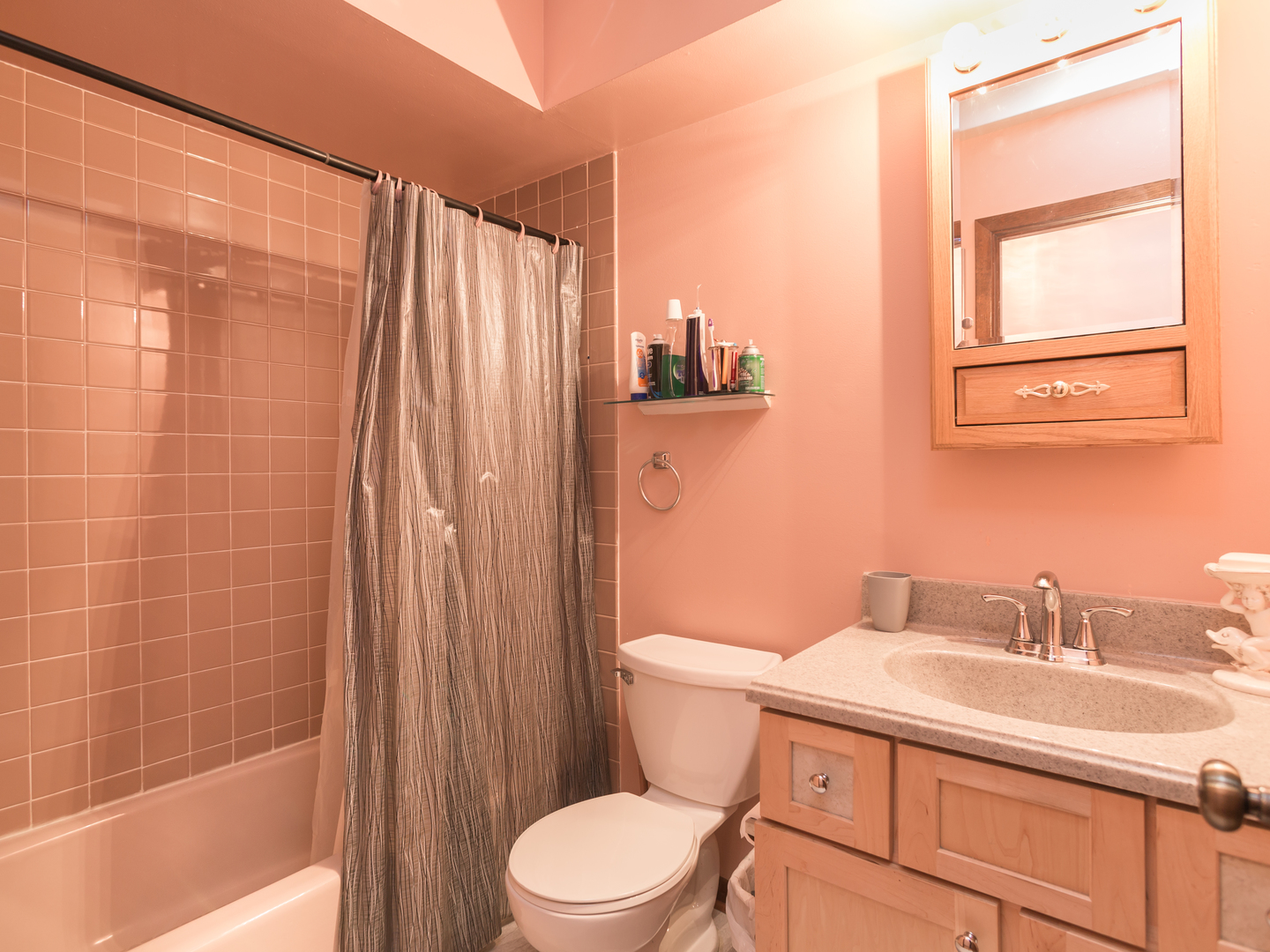 111 East Devon Avenue Bartlett, IL 60103 - Photo 14 of 20 a bathroom with a sink a toilet and shower