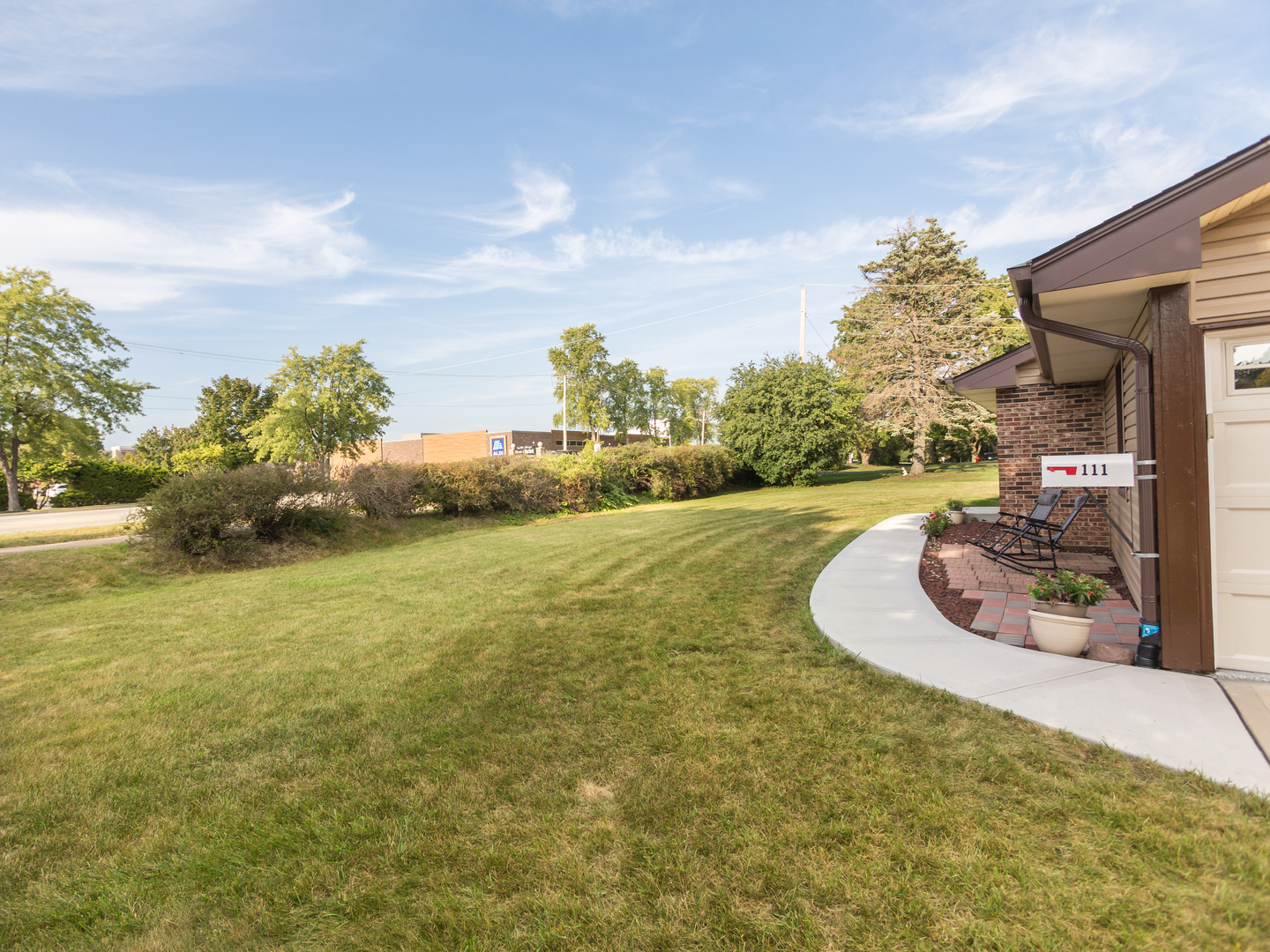 111 East Devon Avenue Bartlett, IL 60103 - Photo 20 of 20 a view of a swimming pool in front of the house