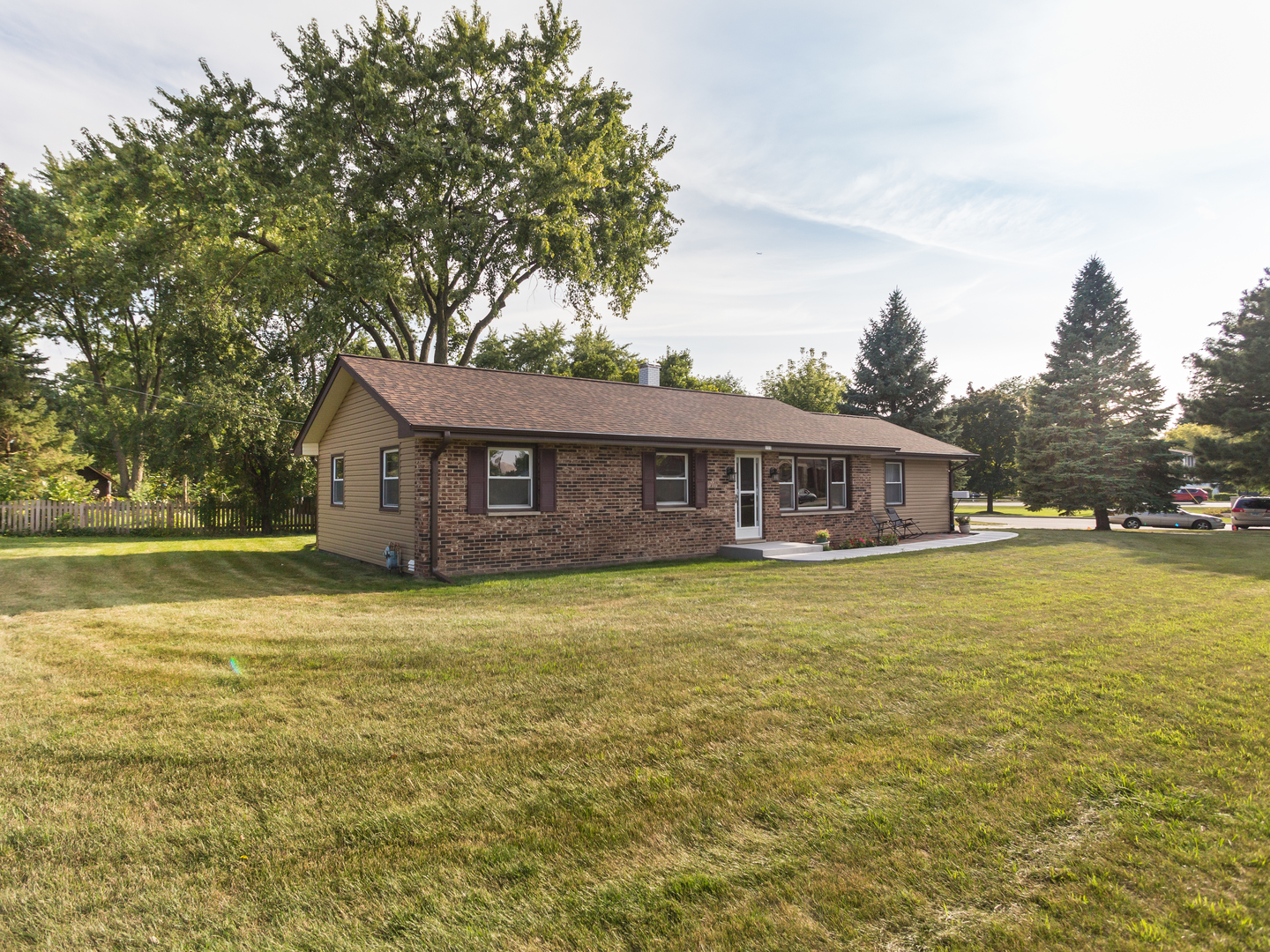 111 East Devon Avenue Bartlett, IL 60103 - Photo 2 of 20 a front view of a house with swimming pool having outdoor seating
