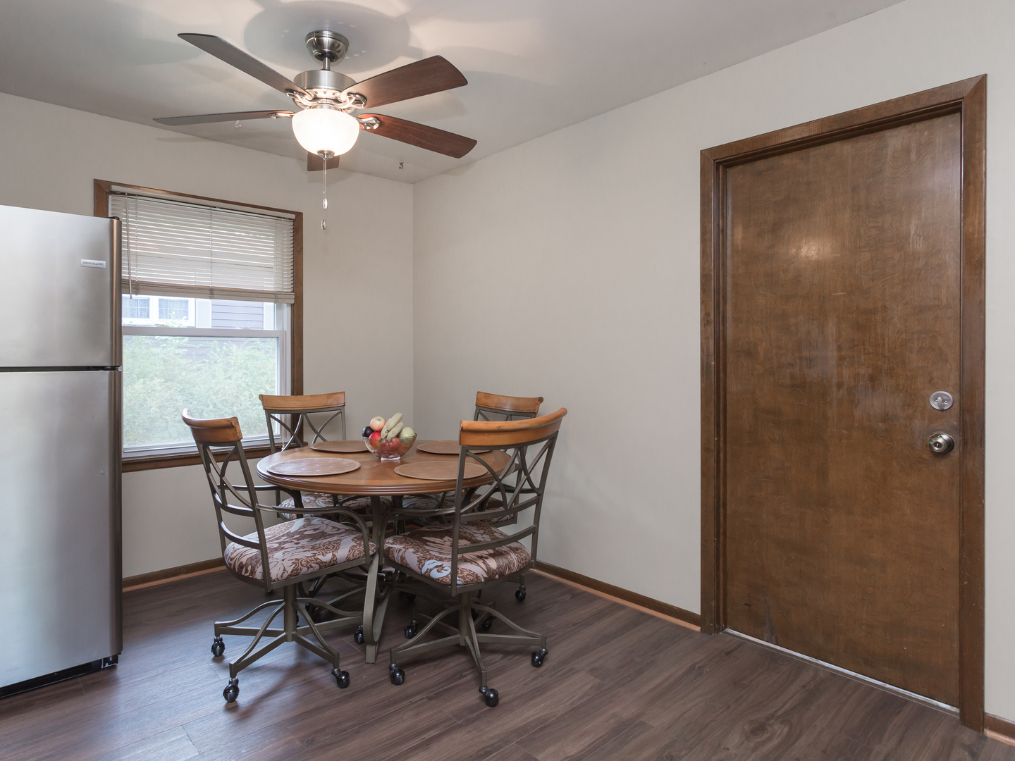 111 East Devon Avenue Bartlett, IL 60103 - Photo 7 of 20 a view of a dining room with furniture window and wooden floor