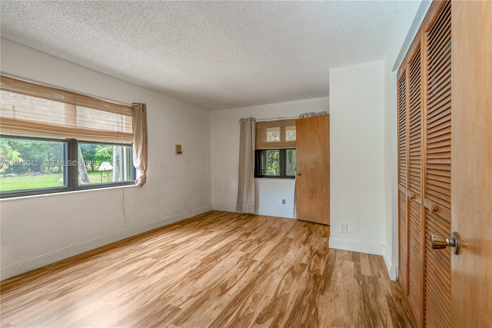 576 Marshall Road West Palm Beach, FL 33413 - Photo 16 of 44 a view of an empty room with a window