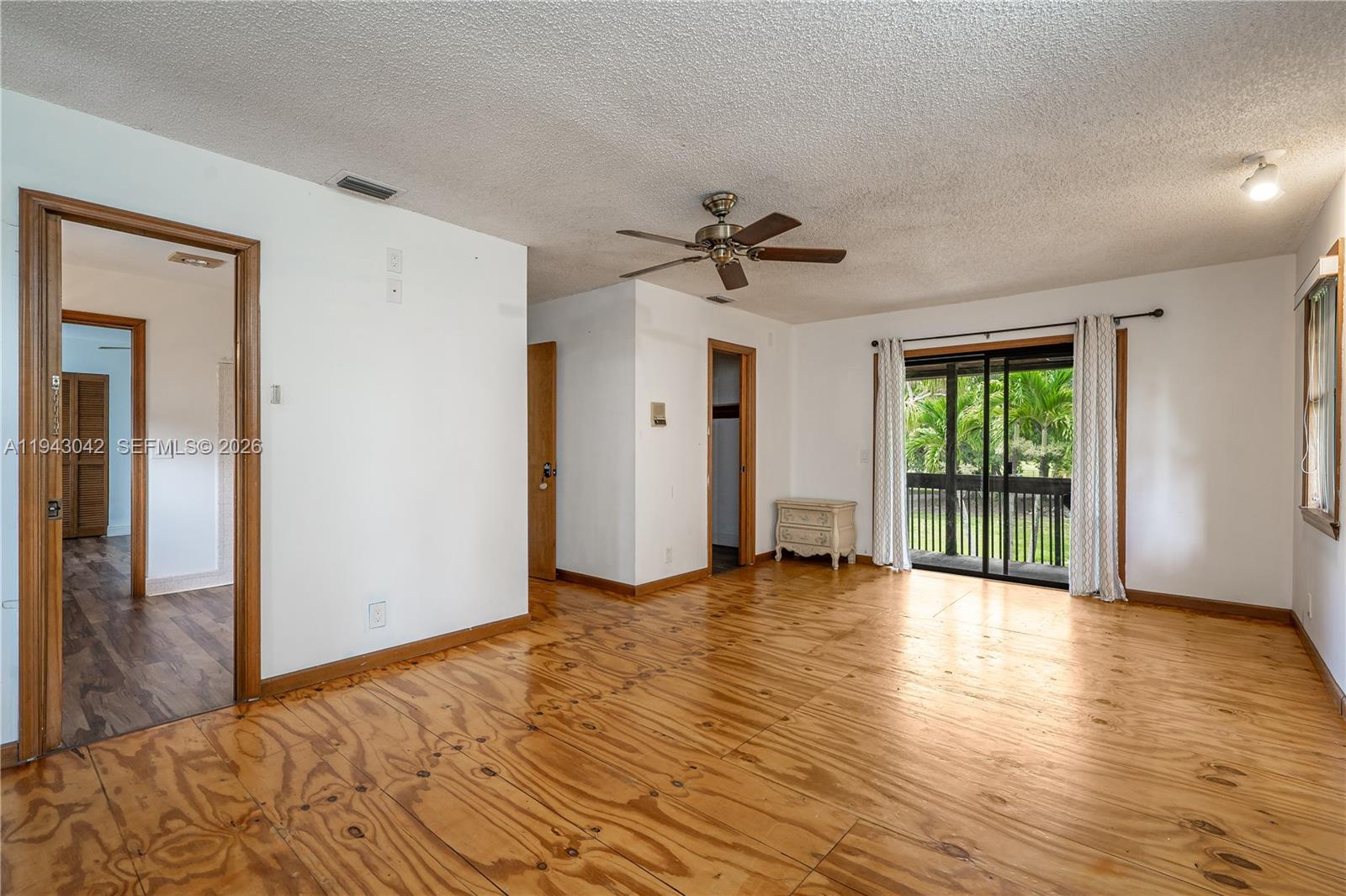 576 Marshall Road West Palm Beach, FL 33413 - Photo 17 of 44 a view of an empty room with a window