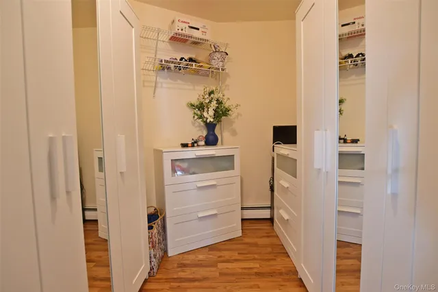 view of a large body of water with a building in the background