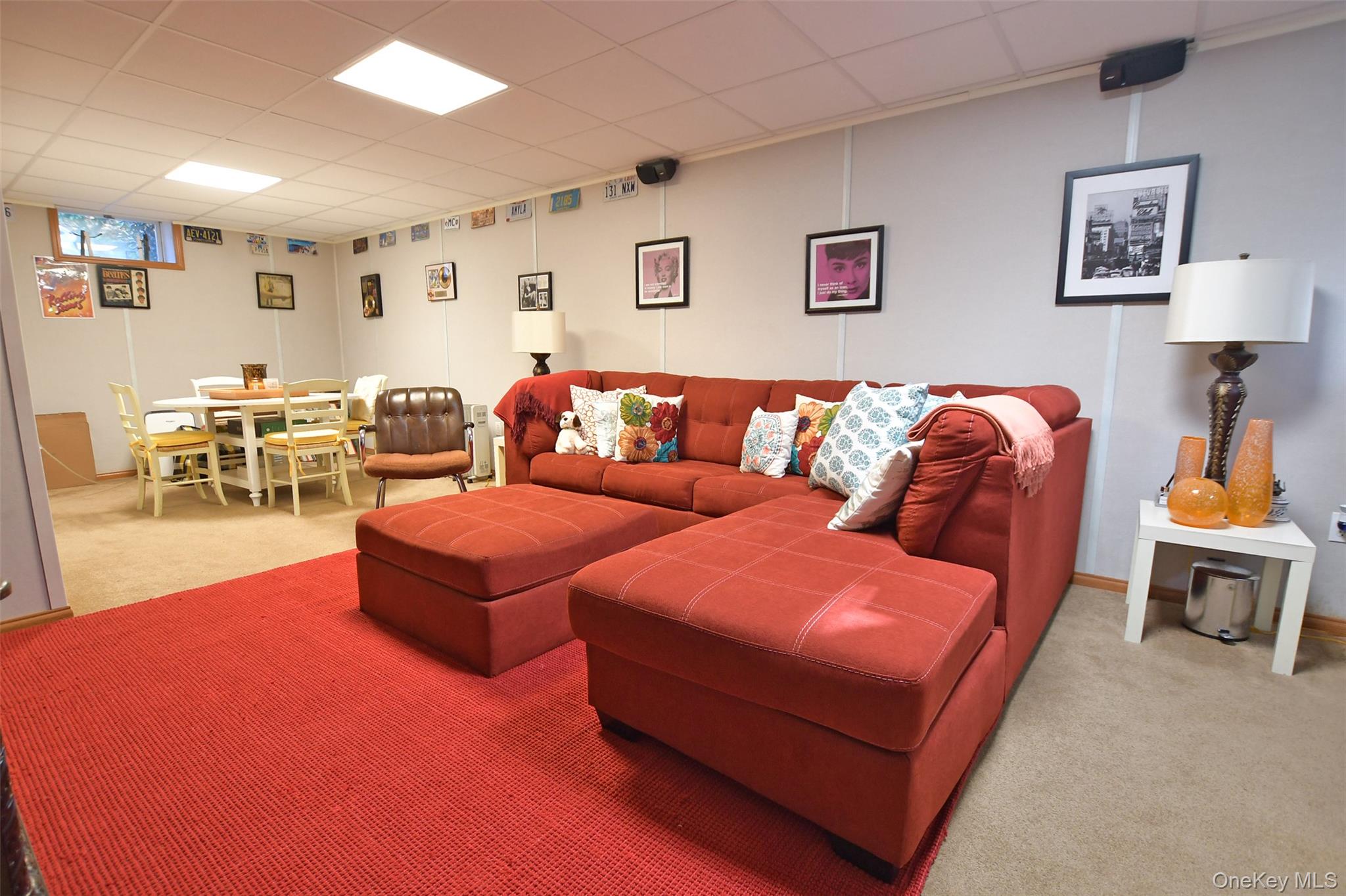 64 Glen Road Baiting Hollow, NY 11933 - Photo 28 of 46 Living area featuring carpet flooring and a paneled ceiling