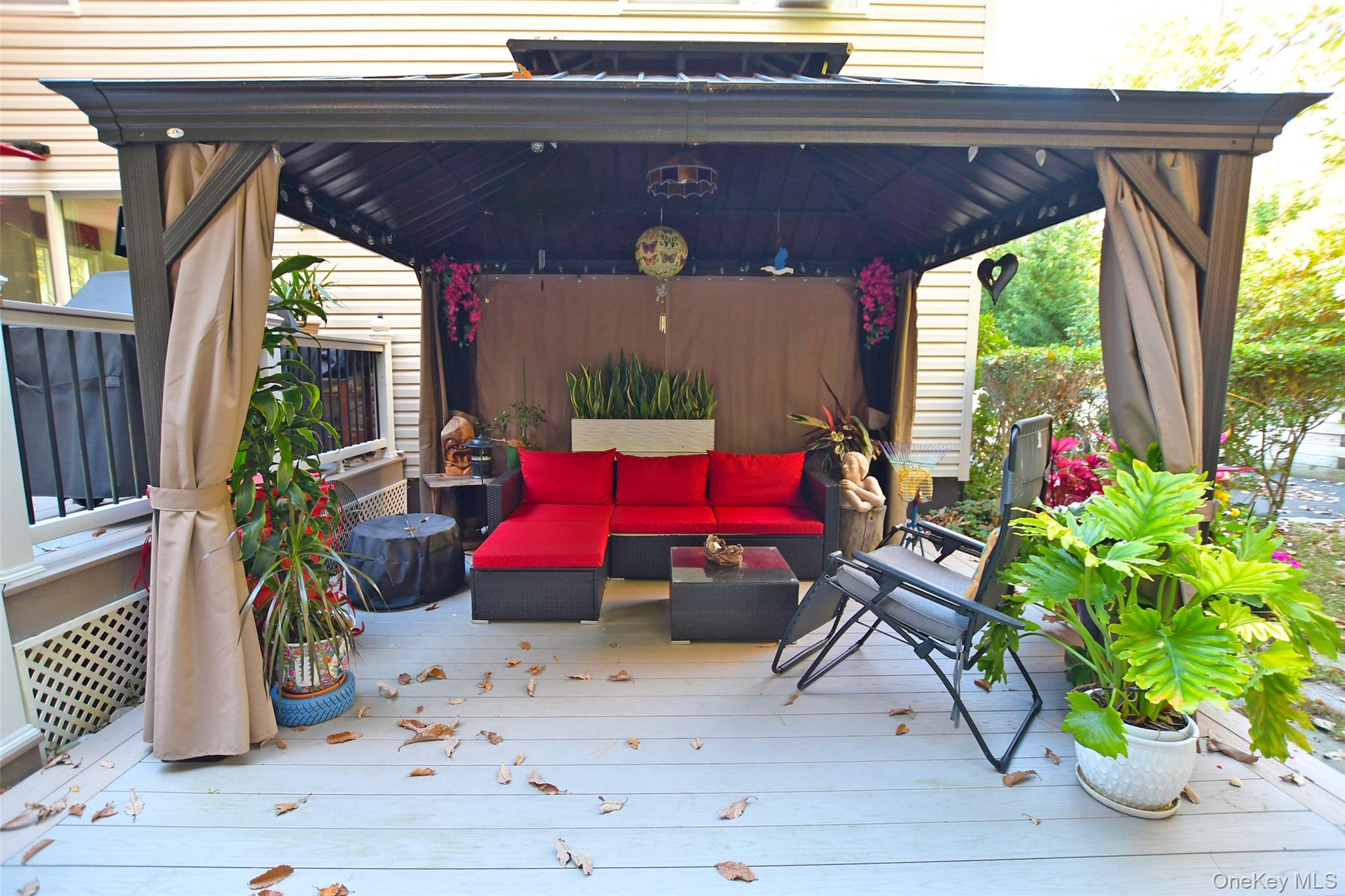 64 Glen Road Baiting Hollow, NY 11933 - Photo 35 of 46 Wooden deck with an outdoor living space and a gazebo