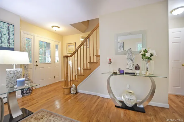 a kitchen with stainless steel appliances a stove microwave and refrigerator