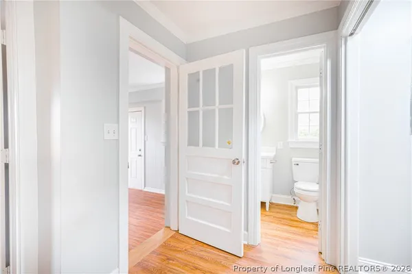 a bathroom with a tub and shower