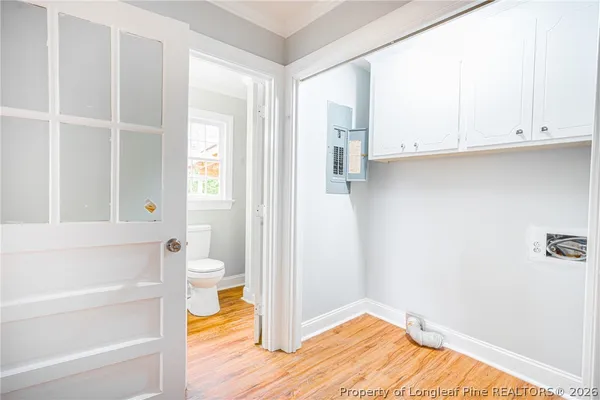 a bathroom with a bathtub and a toilet