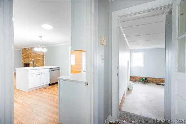 a view of a kitchen with a sink