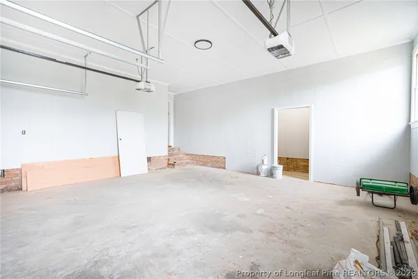 a view of a room with a flat screen tv