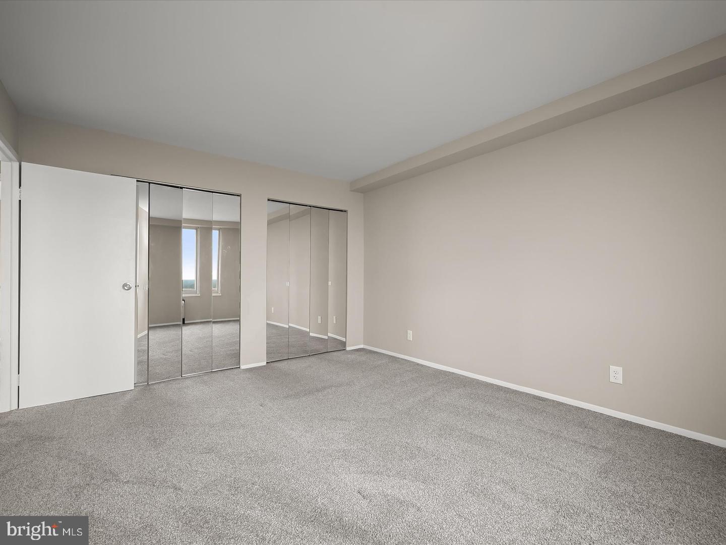 9701 Fields Road, Unit 1607 Gaithersburg, MD 20878 - Photo 13 of 26 a view of an empty room and window