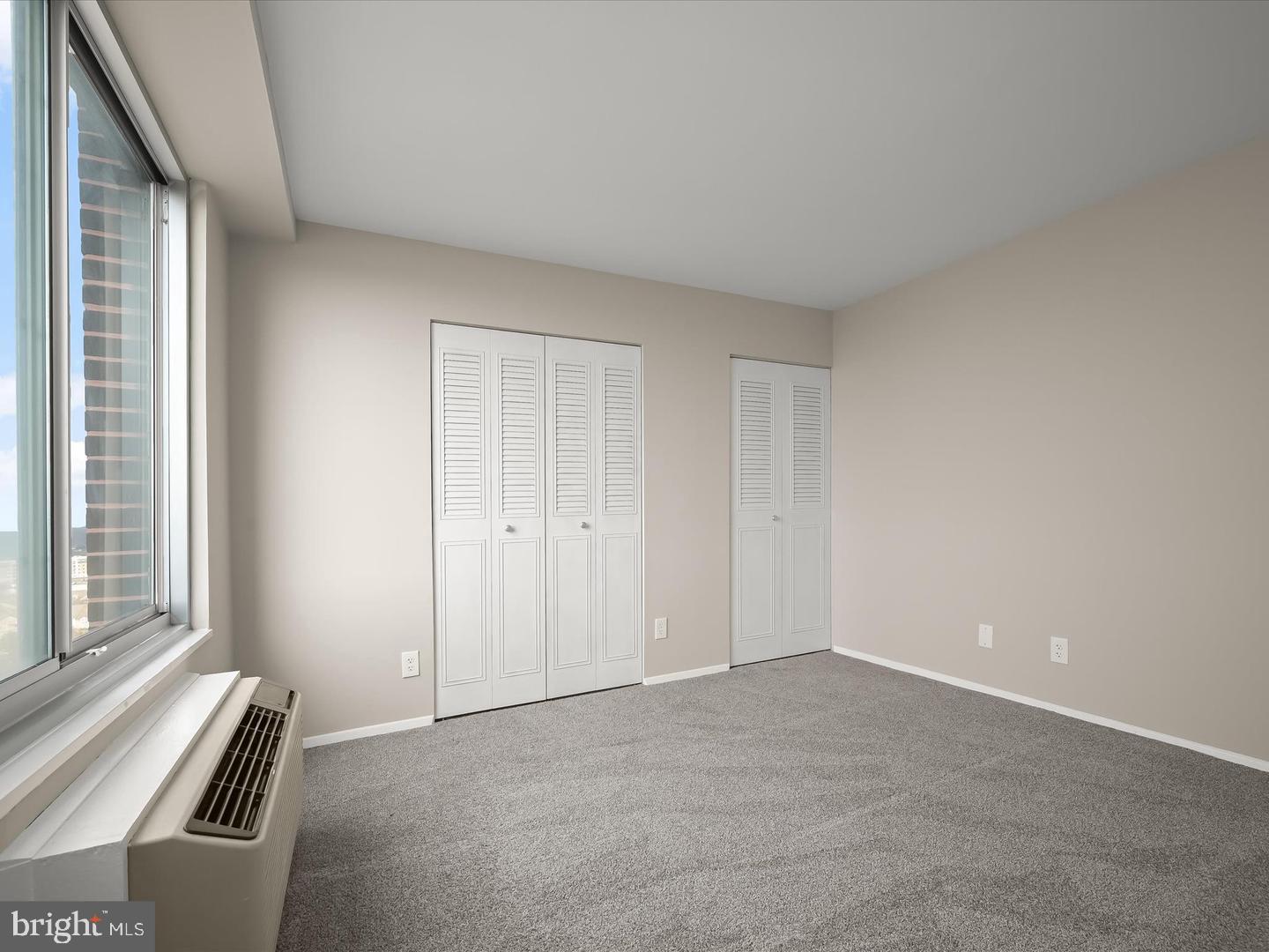 9701 Fields Road, Unit 1607 Gaithersburg, MD 20878 - Photo 16 of 26 a view of an empty room with a window