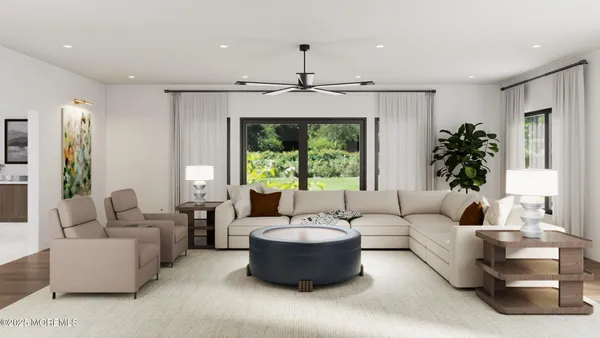 a living room with furniture and a large window